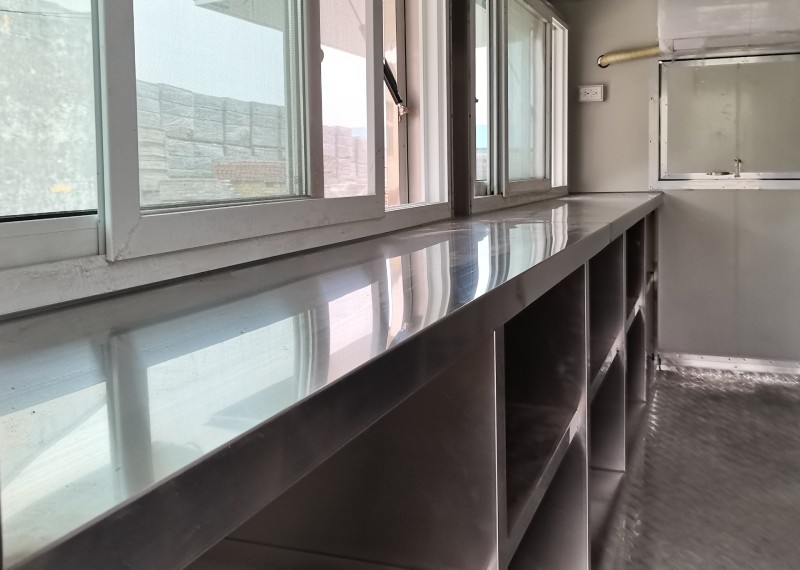 food trailer kitchen with stainless steel workbenches